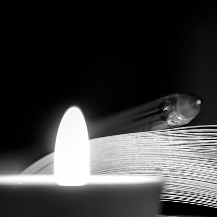 candle reading book